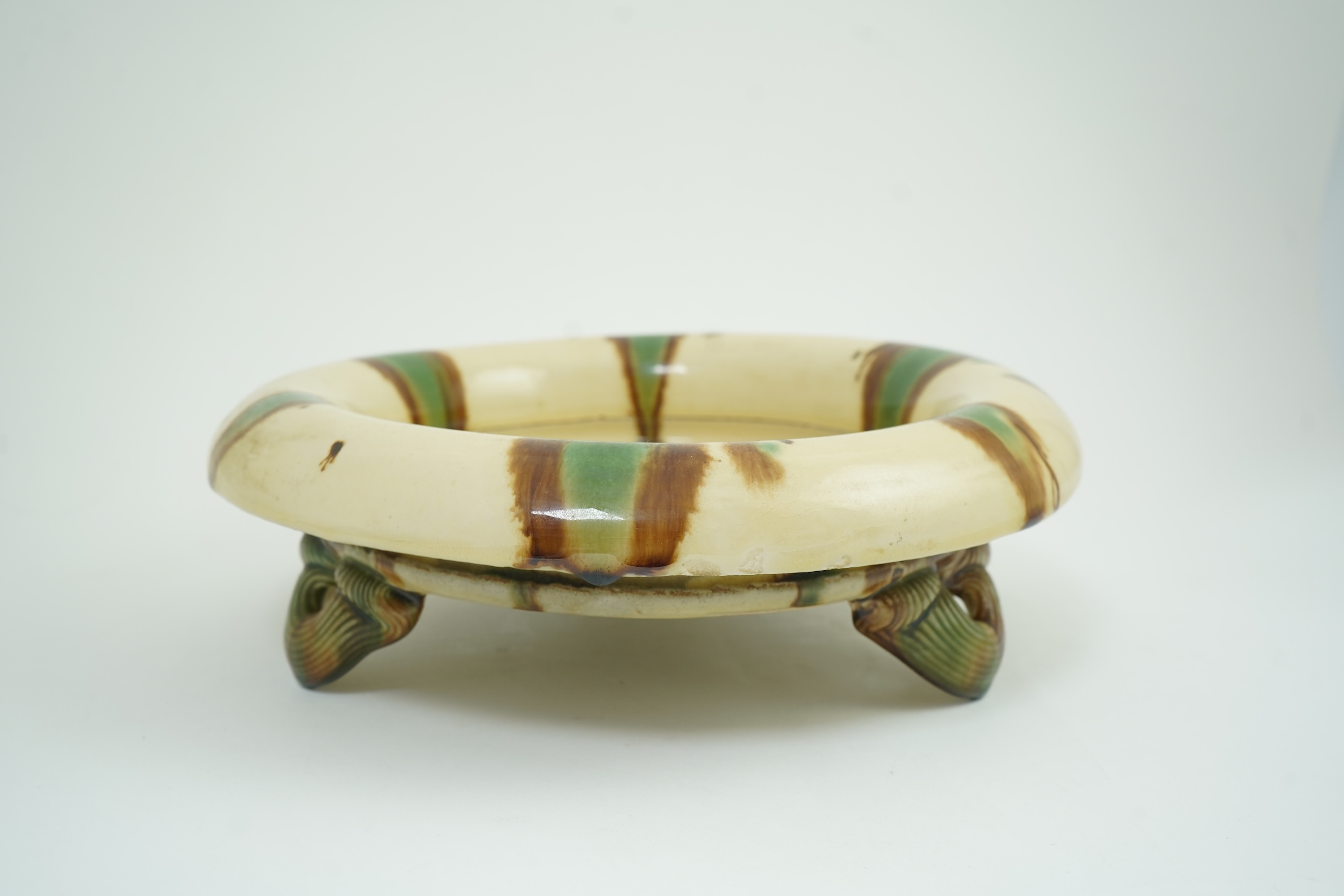 Takeshi Yasuda (Japanese, b.1943): A tricolour stoneware tripod planter